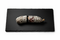 Salame su Tagliere di Ardesia con Sfondo Bianco